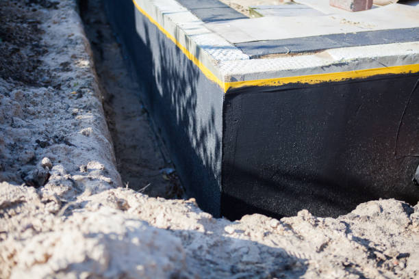 Professional Waterproofing technician working in Basking Ridge, NJ